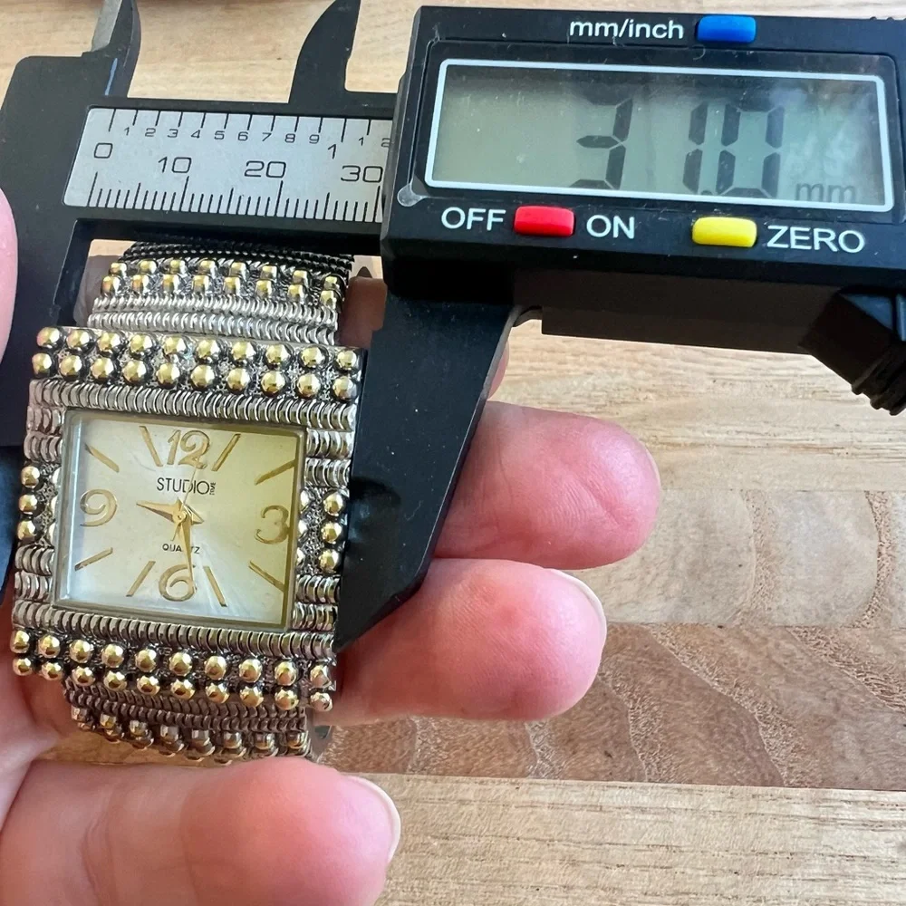Studio time ladies two-tone hinged cuff bracelet watch NEW BATTERY